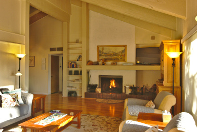 Traditional fireplace and flat-screen TV